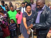 Minister Nomvula Mokonyane with MP Premier David Mabuza share a glass of water from 1 of the new taps in Mathibela Village